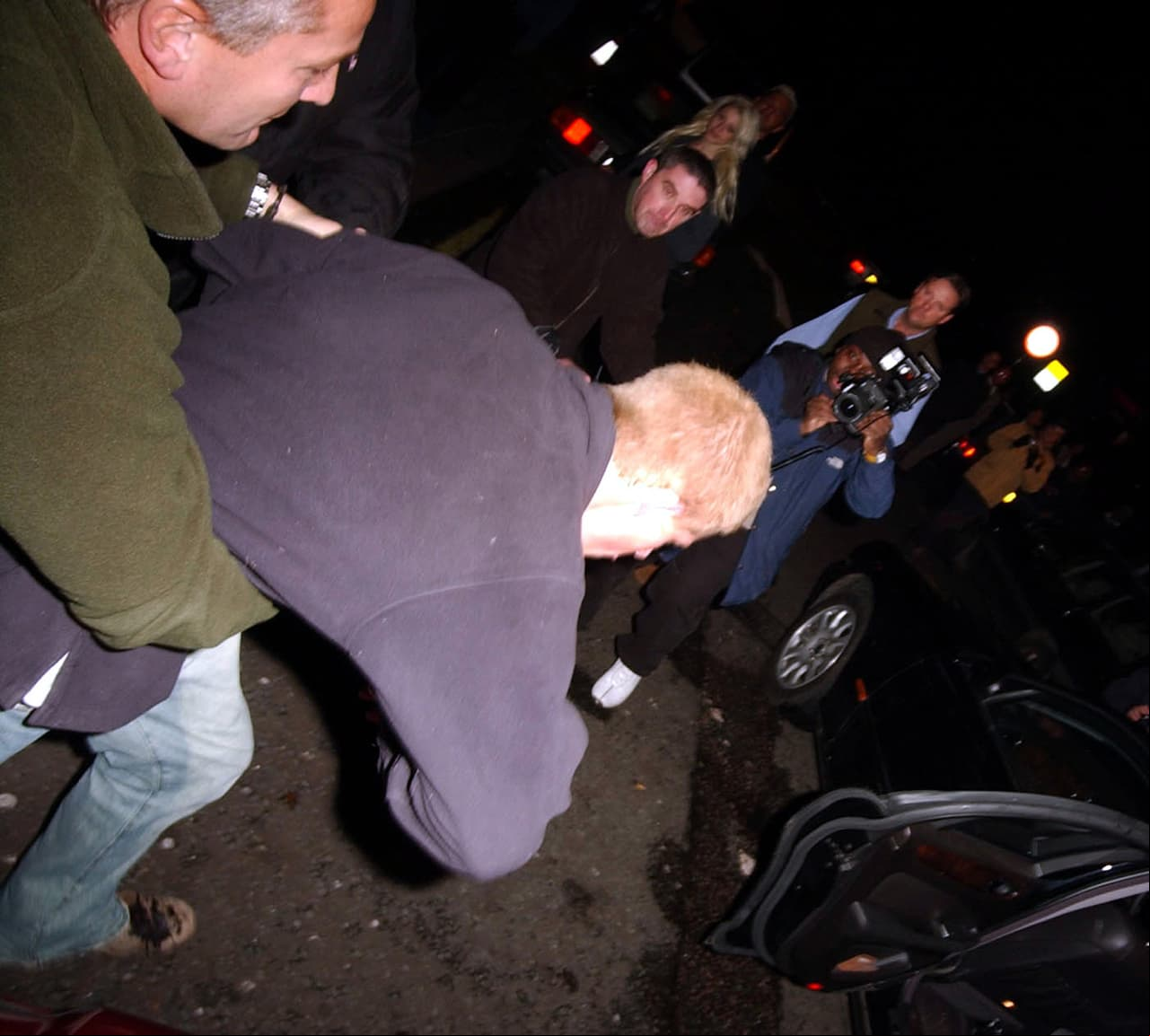 El príncipe Harry agredió a un paparazzi