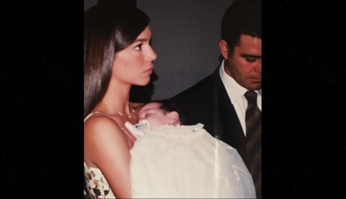 Aquí en el bautizo de su hija Alejandra.